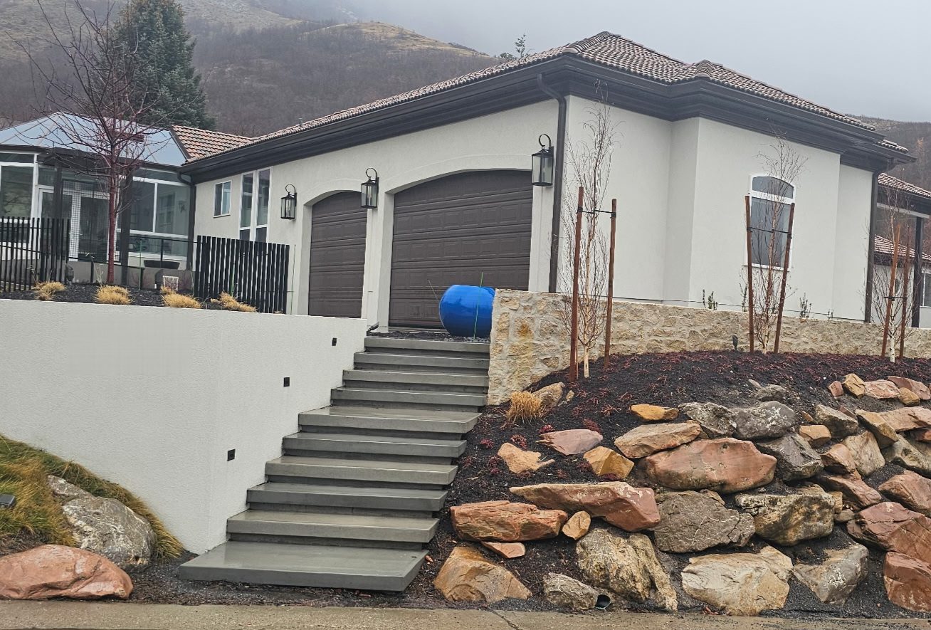 Emigration Canyon Residence: finished stairs & boulder wall